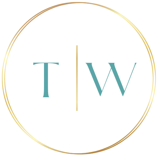A gold circle with the letter t and w in it.